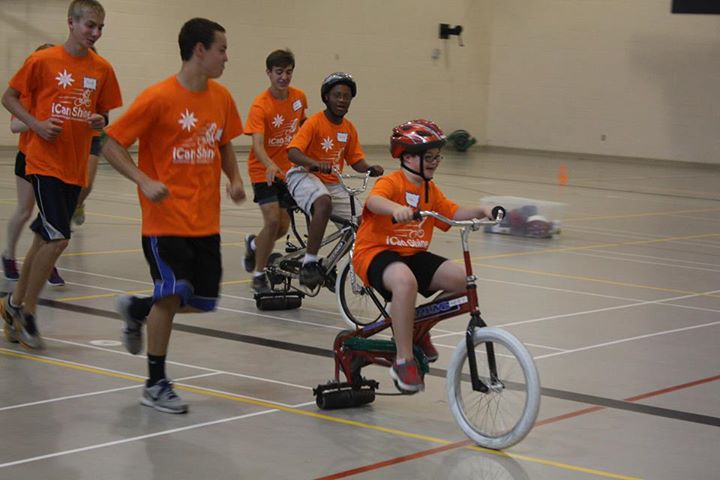 iCan Ride Summer Camp, kids with disabilities learning to ride a bike